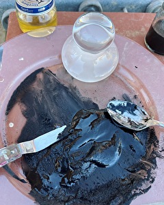 Mixing black pigment from charcoal